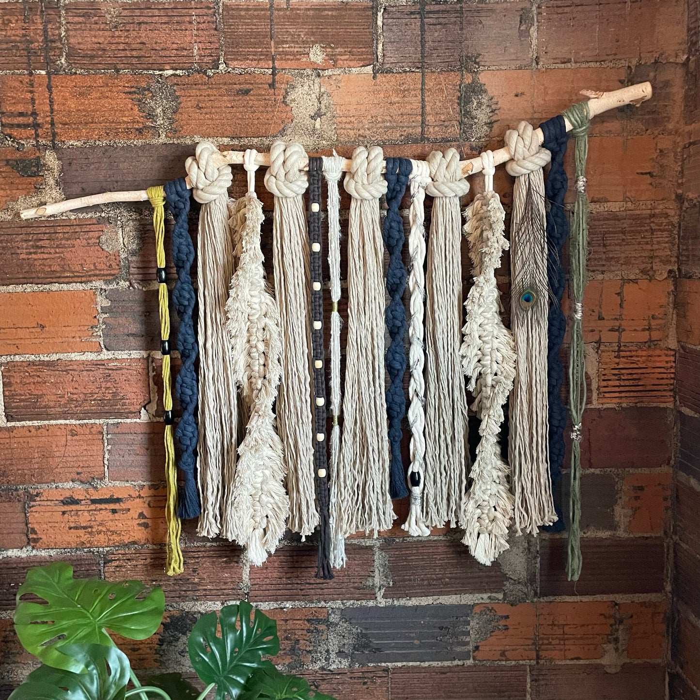 Feathery Fringe Mixed Macrame Wall Hanging On Brick Wall With Feathers Spiral-Twisted